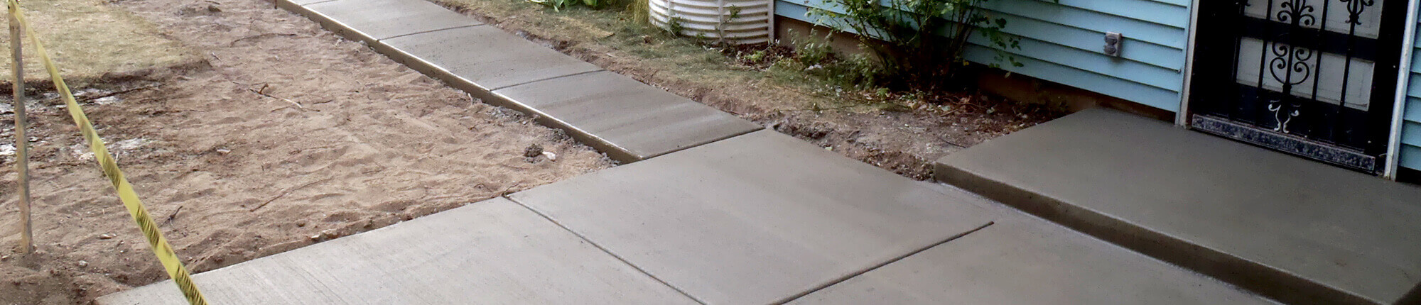 Freshly poured concrete walkway from MUDTeCH