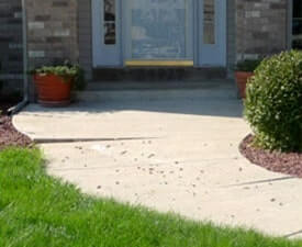 Concrete entrance walk settling - new construction