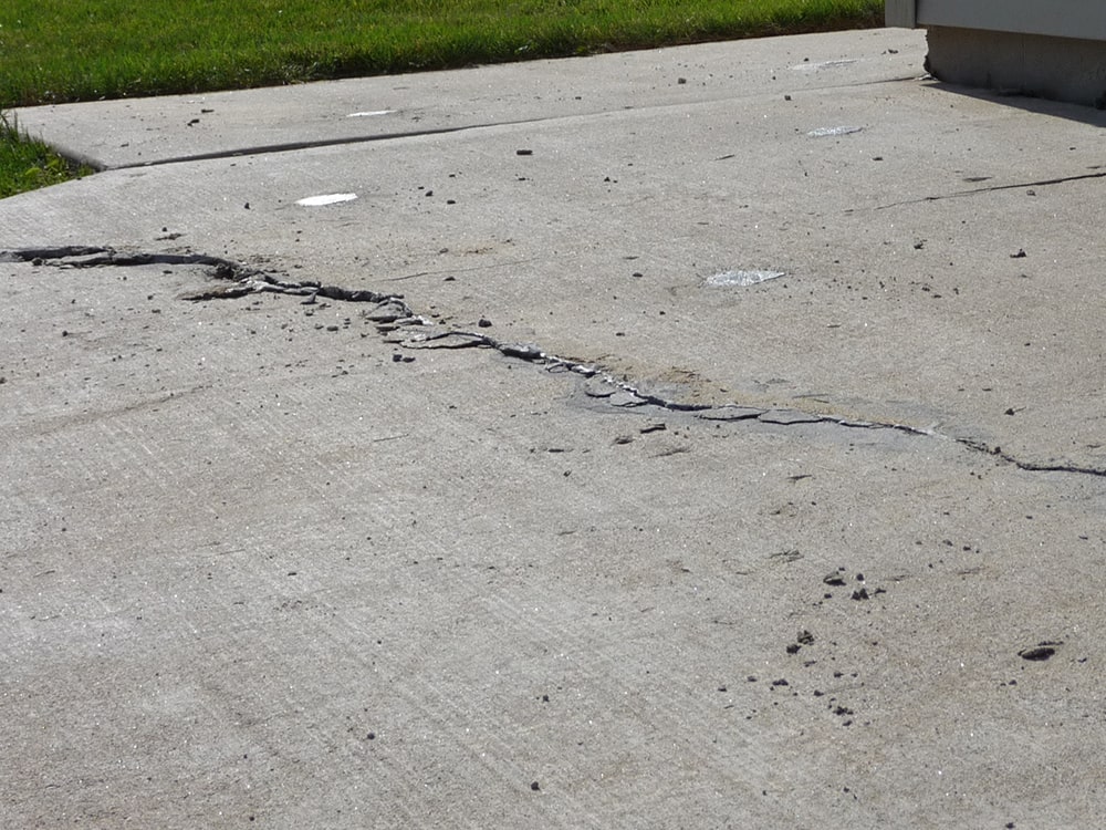 Cracked concrete driveway